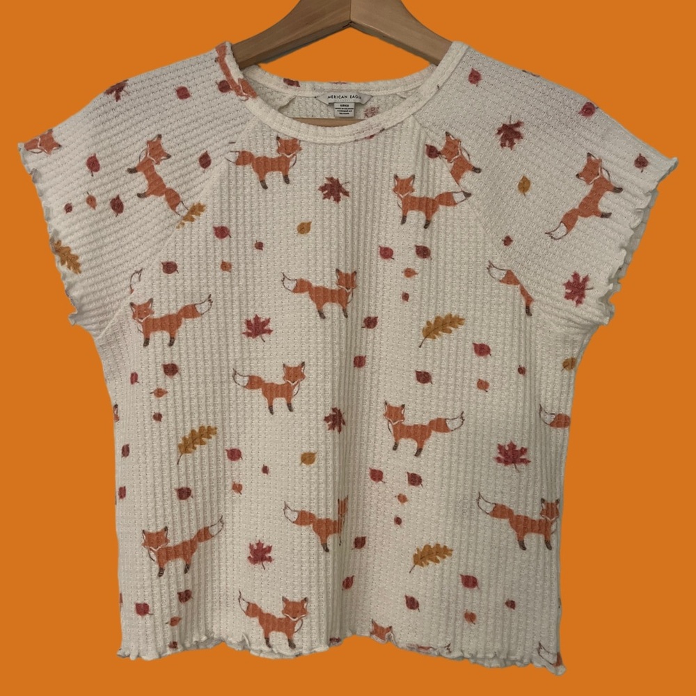 American Eagle Outfitters cream coloured waffle top with fox and leaf pattern